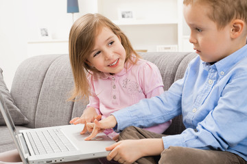 Happy children browsing internet