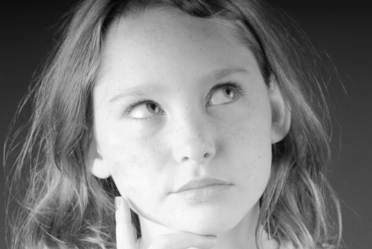 Young girl thinking