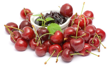 bowl of cherry jam and some fresh fruits