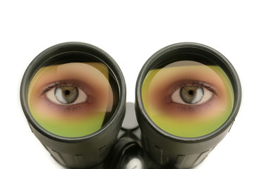 closeup of the lenses of a binocular with eyes