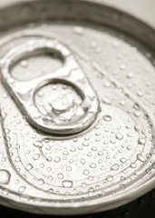 detail of a closed beer can with water drops