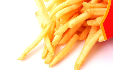 delicious french fries potatoes on white