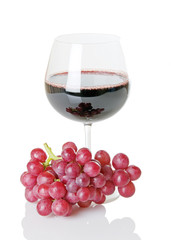 Red Wine In Wineglass With Grapes