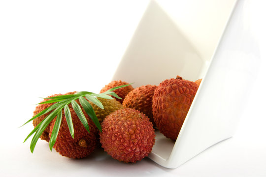 Lychee Spilling out of a Dish with Leaf