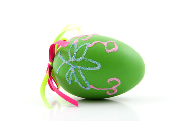 One green easter egg isolated on white background