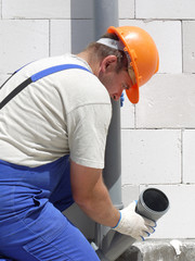 Plumber at work