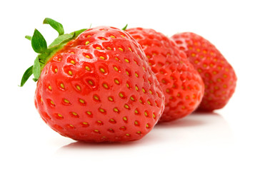 red strawberry fruits isolated on white