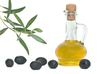Bottle of olive oil and olive branch isolated on white backgroun
