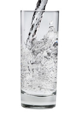 Pouring mineral water stream into a glass