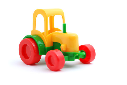 Small Toy Tractor Isolated On White