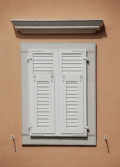 White Shuttered Window