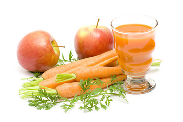 glass of fresh juice, some carrots and apples