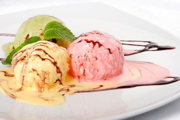 Colored ice-cream closeup on white background