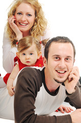 happy young family together in studio