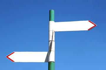 Blank old sign post with two arrows (with empty space)