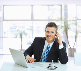 Businessman talking on mobile phone