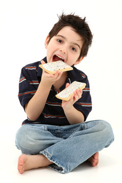 Boy Eating Two Toaster Pastries