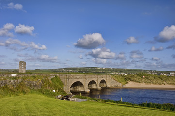 Fototapeta premium rural bridge over water with castle and blue sky