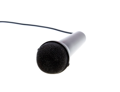 Black microphone with cable isolated over white background