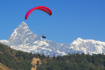 paraglide in nepal with himalaya background