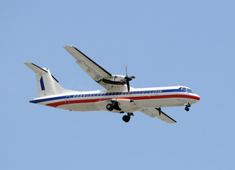 Fototapeta na wymiar Propeller passenger airplane