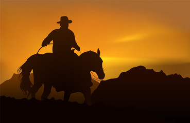 Cowboy over sunset