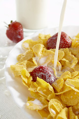 cereals with milk and strawberries