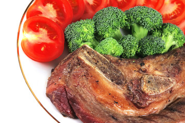 roast juicy steak and vegetables