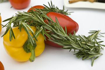Obraz na płótnie Canvas pepper, tomato and rosemary