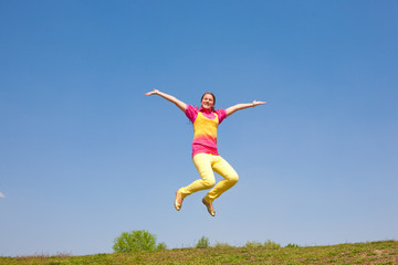 Happy smiling girl - jumping