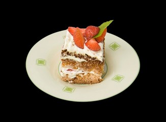 yummy creamy strawberry cake isolated on black