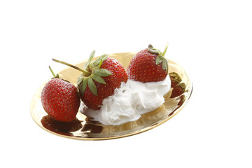 strawberry in a golden plate