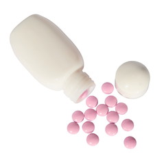 White little bottle with the spilled pills