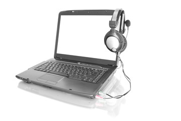 Obraz na płótnie Canvas laptop with stereo headset