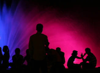 People in front of fountain