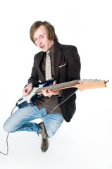 Fototapeta premium Crazy man playing electro guitar