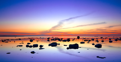 Beautiful sunset with sea and reflections
