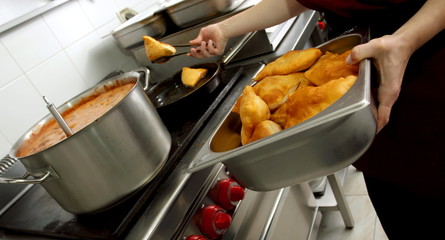batter fried in a restaurant kitchen