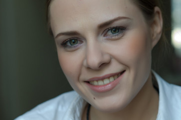 Woman applying makeup