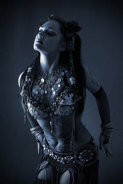 tribal dancer in blue dark