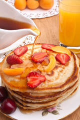 stack of pancakes with syrup