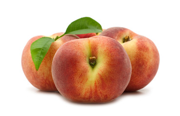 fresh peaches on white background