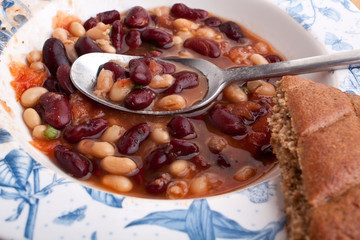 chili with bread and a spoon