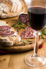 Dinner with french salami and red wine