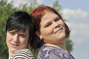 Fototapeta premium sisters in red and black
