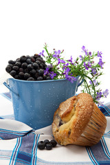 Freshly Baked Blueberry Muffin And a Pail Of Berries