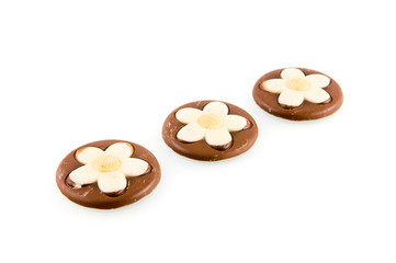 Three chocolates on white background