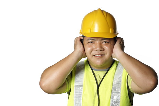 Asian Construction Worker Covering Ears