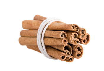 bundle of cinnamon sticks on the white background