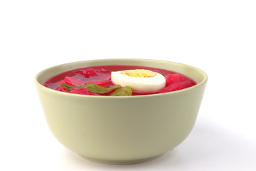 vegetable soup in green bowl